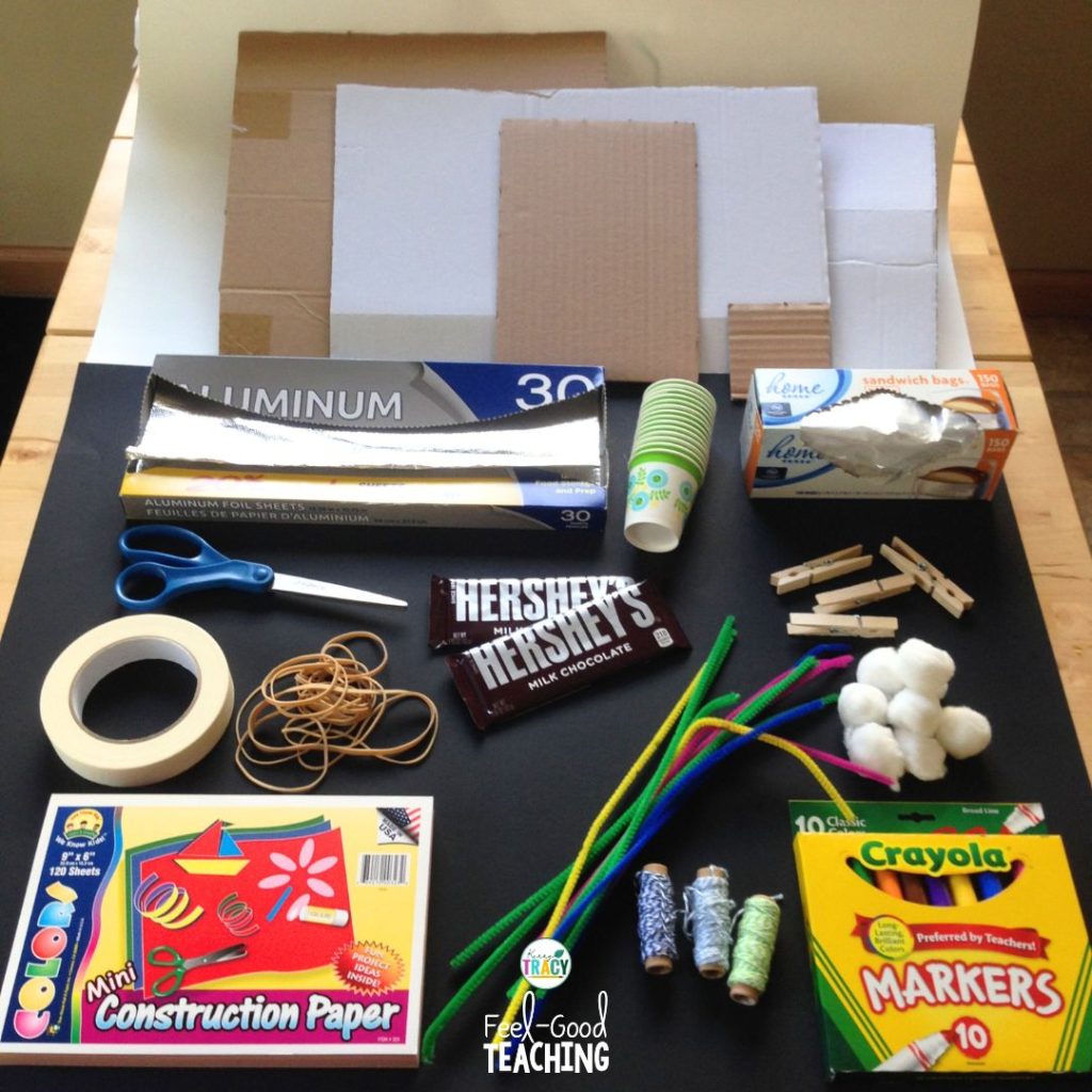Cool Melt STEM Activity materials - chocolate bars, foil, cardboard, plastic baggies, and assorted around the house items